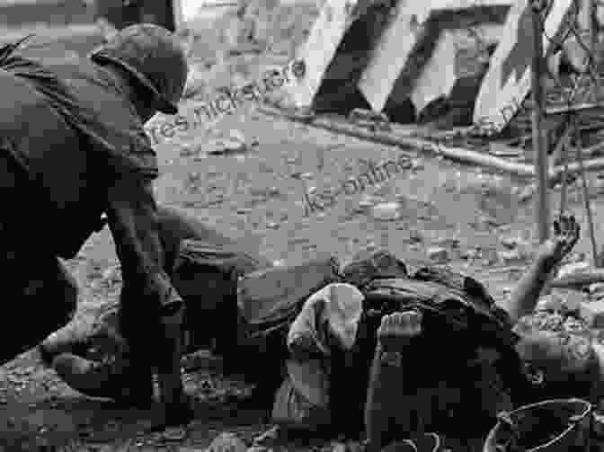 A Black And White Image Of Bob, The Soldier, Holding Hue, The Cat, In His Arms During The Vietnam War. The Cat From Hue: A Vietnam War Story