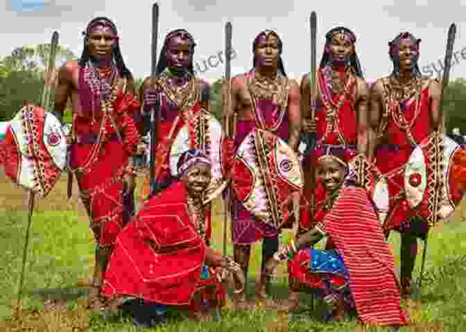 A Maasai Warrior In Traditional Garb, Standing In Front Of A Herd Of Cattle My African Journey Thomas Asbridge