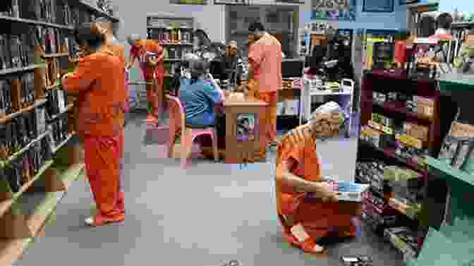 A Photograph Depicting A Prison Library, With Inmates Browsing Through Bookshelves Lined With An Array Of Literature. Reading Behind Bars: A True Story Of Literature Law And Life As A Prison Librarian