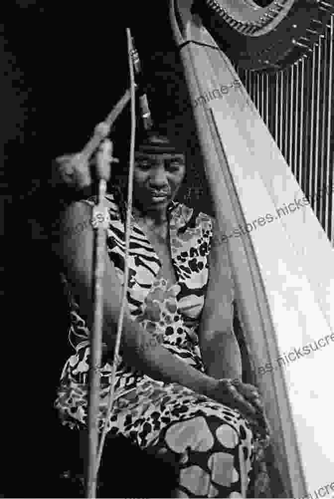 Alice Coltrane Playing The Harp, A Musical Instrument Known For Its Ethereal And Resonant Sound Monument Eternal: The Music Of Alice Coltrane (Music / Culture)