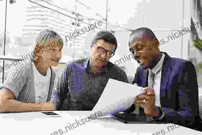 Insurance Advisor Engaged In A Professional Meeting With Client How To Sell Property And Casualty Insurance : Understanding Insurance Sales Tips And Techniques