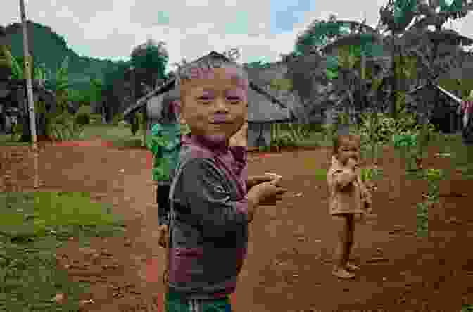 Mark Boyter Standing In A Laotian Village, Surrounded By Children Crescent Moon Over Laos Mark Boyter